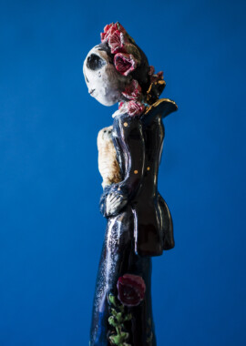 Porcelain, underglaze, and glaze.